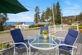 West facing deck with views of water