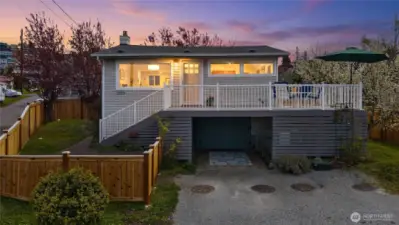 Off street parking and basement patio entrance