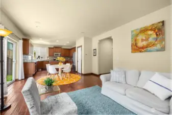 Living and dining areas flow into the kitchen.