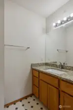 Half bath with granite counter on the Main floor