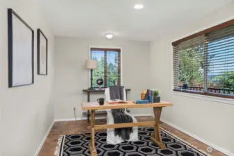 Office area just off of the kitchen is a perfect play room or bonus space.