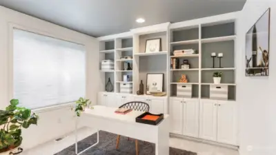 This darling nook is located just off the living room featuring double door entry, built-ins, new carpet and a large window making it the perfect home office space.