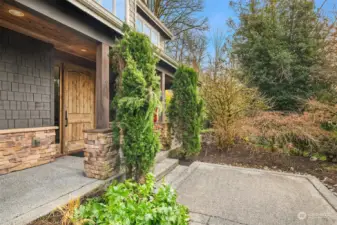 A covered front porch greets you at the entry.