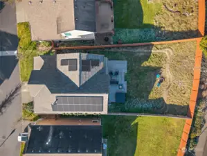 Overhead view showcasing the large yard, newer roof & solar panels.