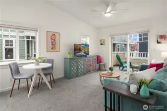 This back corner unit is bathed in natural light and features soaring vaulted ceilings.