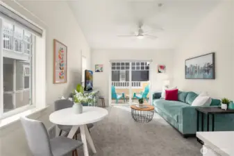 The living room / dining room features new paint, sheet rock, flooring and more.