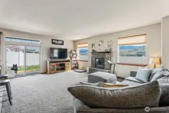 Open living room with gas fireplace