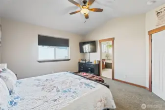 primary bedroom with attached full bath