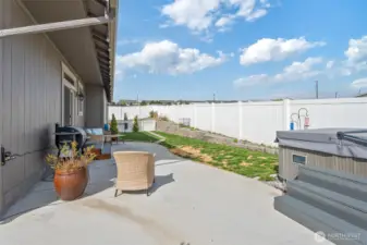 fenced backyard with irrigation water