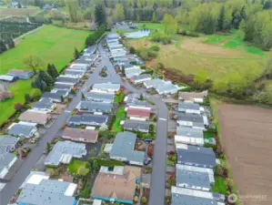 Aerial view of the community that leads back to rv parking and walking trails in this beautiful country setting.