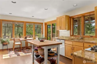 Sunbathed interior warm the heart and welcomes the day! Slider door opens onto deck for easy flow indoor-outdoor action.