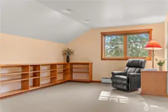 Spacious open second floor has enough room to be used in multiple ways.