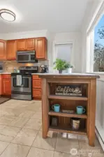 Kitchen area with eat in space