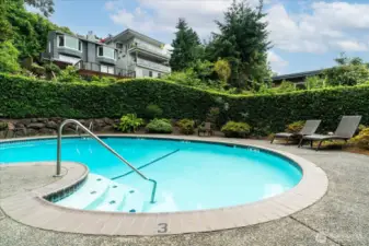 Enjoy some sunny relaxation at the community private pool area, with heated swimming pool