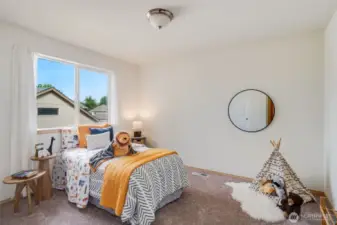 Here is the second bedroom, located upstairs.