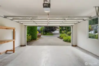 Plenty of storage for tools, garden supplies, and your kayak in this two car garage.