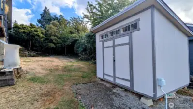 Rear Shed with approximately 80 sqft of storage, 220 outlet and cleanout!
