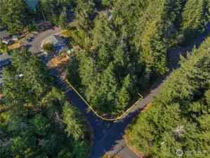Picture your Dream House here on this large level corner lot.