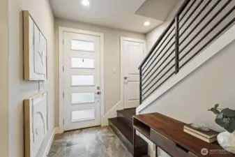 Let's go upstairs, with upgraded hardwood steps and rod iron railing