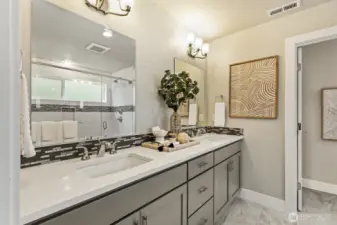 Luxurious spa-inspired primary bath with premium finishes