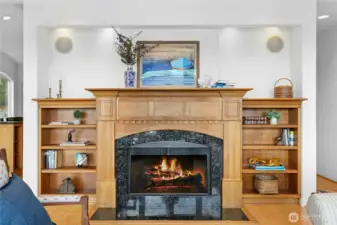 Curl Up with a Book in the Great Room featuring a Wood Burning Fireplace with Gas Starter!