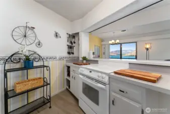 Kitchen view looking towards the glass sliding doors leading to the lake view deck.