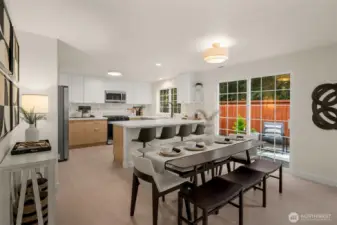 Open floor plan for large dining space, eat-up ktichen and easy access to private backyard