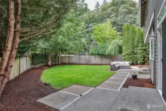 Level landscaped Back Yard and Patio is easy to maintain, ideal for gardening!