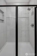Full tile shower in primary bath (photos of lot34, same floorplan)