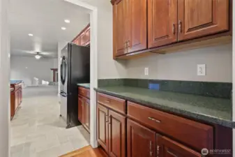 Extra cabinets through the walkway to kitchen