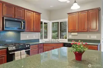 Kitchen with gas stove and newer dishwasher