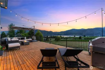 Exterior twilight view 3 of upper level deck.