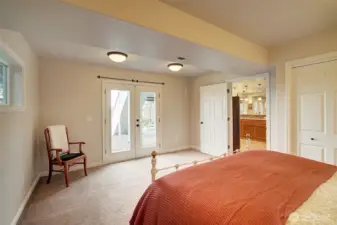 Basement bedroom has French doors leading to west facing patio and good size closet