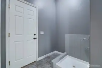 Dog wash in utility room right off garage