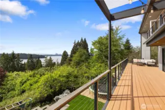 Situated far away from the street, this home features an expansive west-facing deck ideal for entertaining or relaxing in a peaceful, private setting.