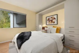 On the lower floor, find a comfortable and private guest bedroom with ample space for a King size Murphy bed.