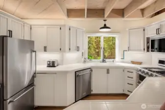 Light and bright kitchen with open beams and lots of storage