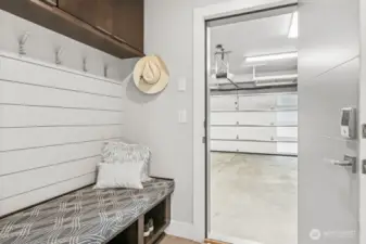 perfect catch all spot at the garage entry - bench, coat rack, shoe shelves and storage