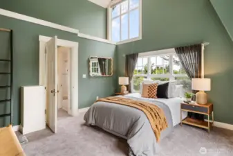 The largest of the three upstairs bedrooms features new carpet, vaulted ceilings and great natural light.
