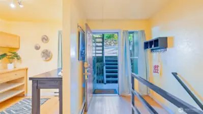 Only seven steps from your designated parking spot and you're at the front door! This home has been lovingly renovated from top to bottom - check out that eye-catching black metal railing for a pop of modern style.