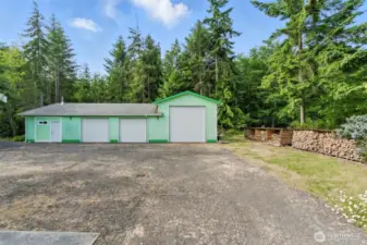 The impressive 2,017 sq ft detached shop features four bays, including one with a 12-foot door for RV parking, and a recreation room with heat and a ¾ bathroom. This versatile building offers abundant room for storage, projects, and recreational vehicles—all just steps from the main home.