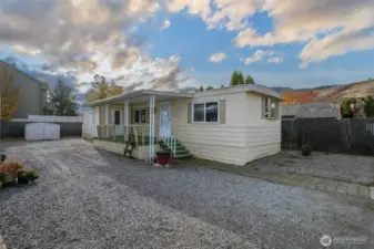 Home on location with metal stoprage shed (included)