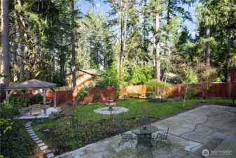 Beautiful, very private backyard with gazebo, oversized patio & established landscaping