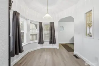 Breakfast nook off kitchen. Entry beyond