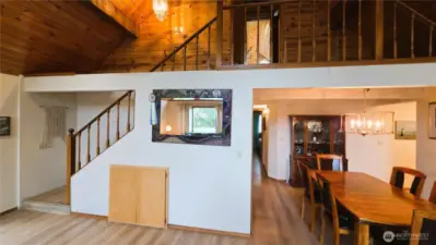 Dining area leads to kitchen and family room