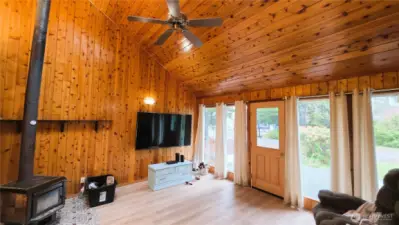 Family room with front door out to west facing deck.