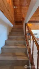Stairs to the second floor suite and bonus/office/playroom