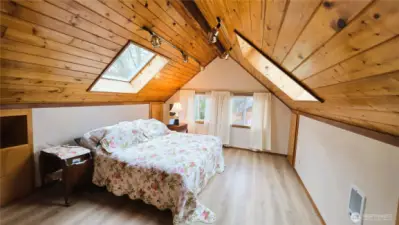 Second floor suite with skylights and ensuite bathroom and built-in    storage