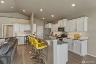 Split-level island with elevated breakfast bar