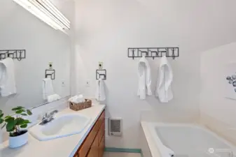 Giant soaking tub and lots of counter space is inviting.